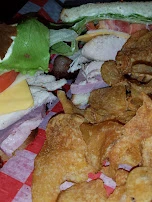 Huge Smoked Club Sandwich and Chips